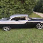 1955 Pontiac Chieftain, passenger side profile showing the red interior through the hardtop side glass