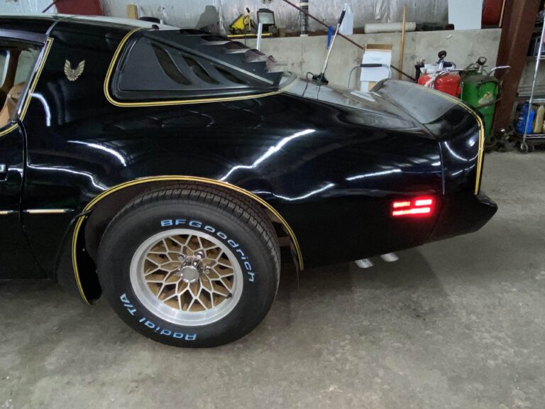Gold snowflake wheel and BFGoodrich Radial T/A tire on a 1979 Pontiac Trans Am SE