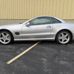 2004 Mercedes-Benz SL55 AMG side profile with the hardtop raised