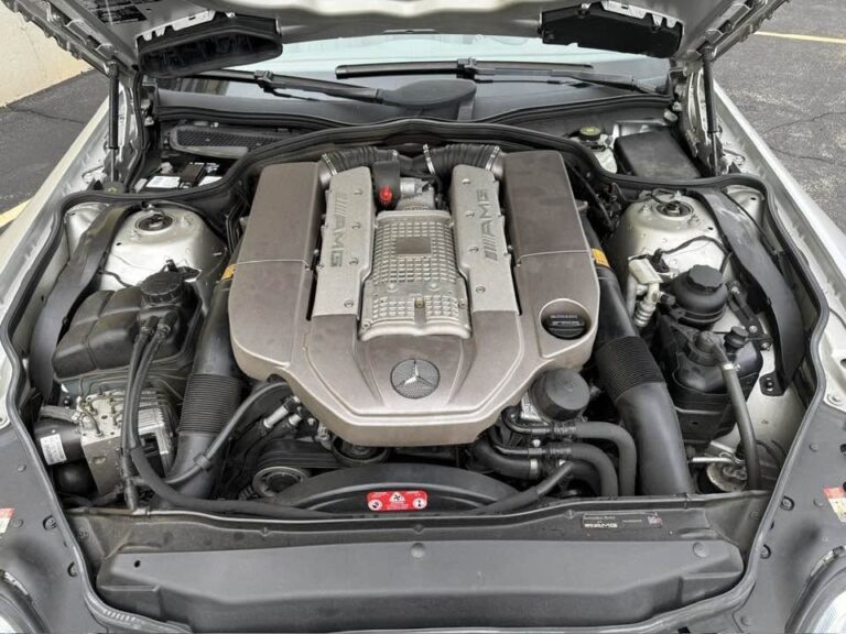 Supercharged 5.5L AMG V8 engine bay of a 2004 Mercedes-Benz SL55 AMG