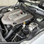 Engine bay detail of a 2004 Mercedes-Benz SL55 AMG