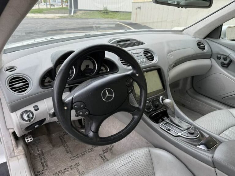 Grey leather interior and dashboard of a 2004 Mercedes-Benz SL55 AMG