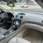 Interior of a 2004 Mercedes-Benz SL55 AMG viewed from the passenger side