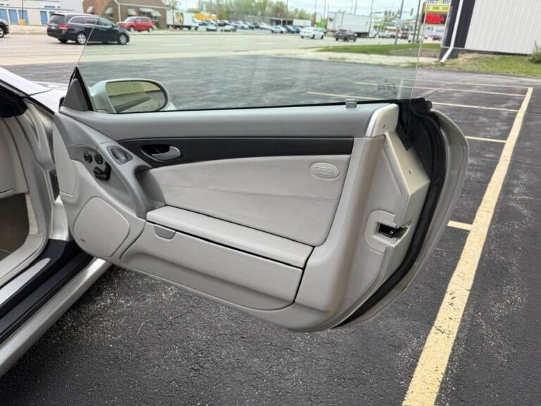 Driver door panel of a 2004 Mercedes-Benz SL55 AMG in grey leather