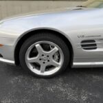 AMG wheel and V8 Kompressor fender badge on a 2004 Mercedes-Benz SL55 AMG