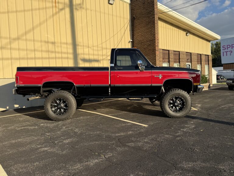 1983 Chevrolet K20 Silverado 4x4, full driver-side profile showing the long bed