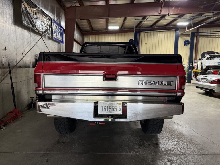 1983 Chevrolet K20 Silverado 4x4, rear view with chrome bumper and Chevrolet tailgate