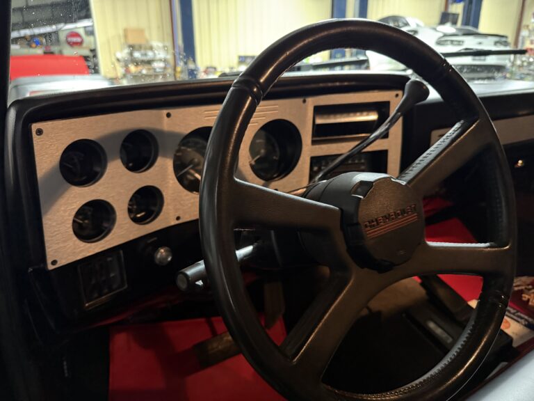 1983 Chevrolet K20 Silverado 4x4, dash with six-gauge cluster and four-spoke steering wheel