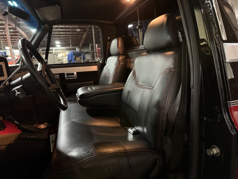 1983 Chevrolet K20 Silverado 4x4, black leather front seats with red contrast stitching