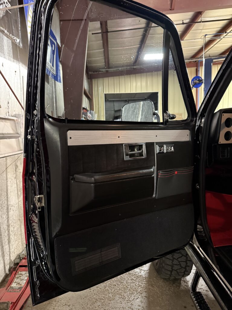 1983 Chevrolet K20 Silverado 4x4, driver door panel with power window and lock switches