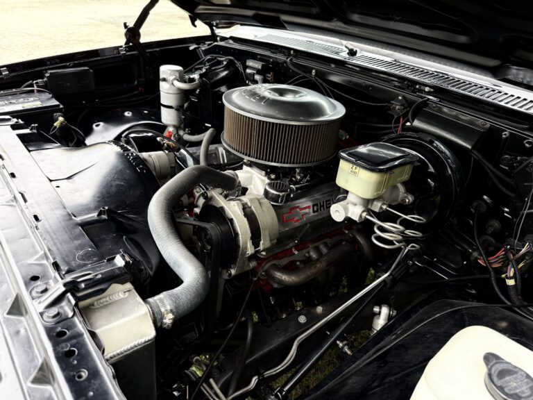 1983 Chevrolet K20 Silverado 4x4 engine bay with chrome air cleaner
