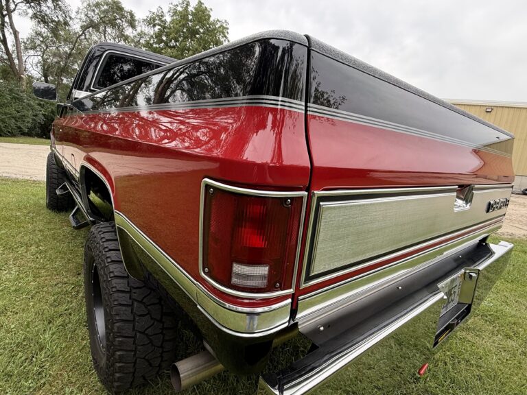 1983 Chevrolet K20 Silverado 4x4 rear three-quarter view with the bed cover on